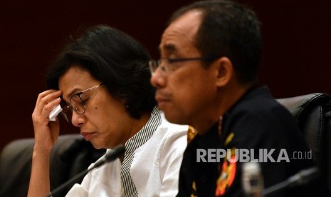 Menteri Keuangan Sri Mulyani (kiri) dan Dirjen Bea Cukai Heru Pambudi. Ditjen Bea Cukai Kemenkeu akan melakukan investigasi dugaan penyelundupan komponen motor Harley Davidson melalui pesawat Garuda Indonesia.