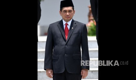 Menteri Perdagangan Agus Suparmanto bersiap mengikuti foto bersama seusai pelantikan menteri Kabinet Indonesia Maju di Beranda Istana Merdeka, Jakarta, Rabu (23/10/2019).