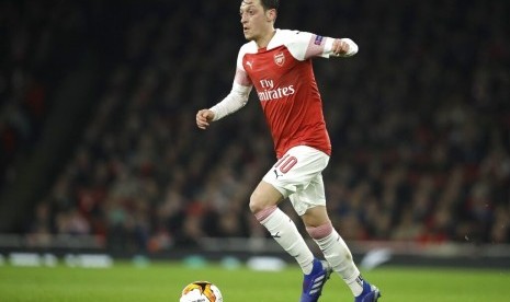 Cicitan Mesut Oezil soal Uighur direspons China dengan batal menayangkan laga Arsenal vs Manchester City.