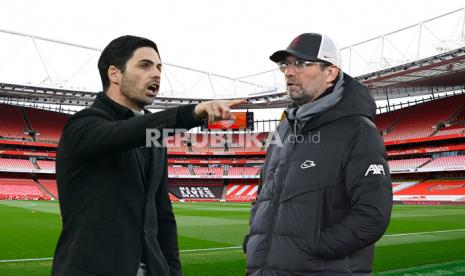 Mikel Arteta vs Juergen Klopp, duel taktik laga Arsenal vs Liverpool di Stadion Emirates, Ahad (4/4) dini hari WIB.