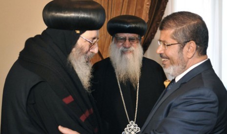  Mohamed Morsi (Right)