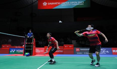 Mohammad Ahsan/Hendra Setiawan beraksi di Japan Open 2023.