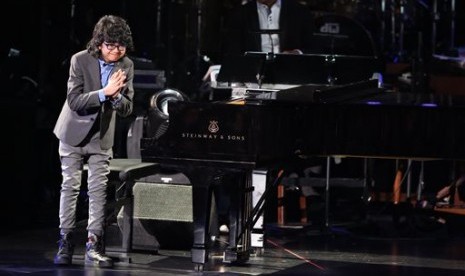 Musisi cilik Indonesia Joey Alexander saat tampil di panggung Grammy Awards, (16/2).