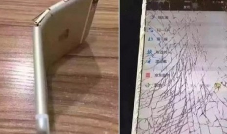 Netizen Cina menghancurkan Iphone 6 karena AS ikut campur dalam konflik Laut Cina Selatan.