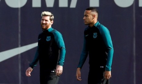 Lionel Messi dan Neymar (kanan) saat masih memperkuat Barcelona.