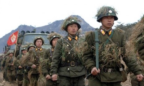 North Korean soldiers attend military training in an undisclosed location in this picture released by the North's official KCNA news agency in Pyongyang March 11, 2013.