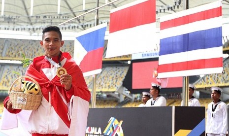 Nur Ferry Pradana, peraih emas nomor lari 400 meter T47 putra. 