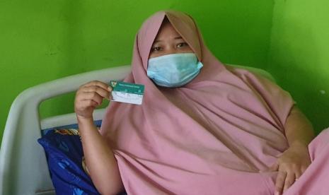 Nurhaeni (40 tahun), seorang ibu rumah tangga mengaku sangat terbantung dengan menjadi anggota JKN KIS.