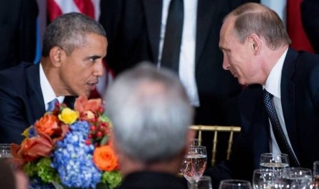 Obama dan Putin saat acara jamuan SIdang Umum PBB