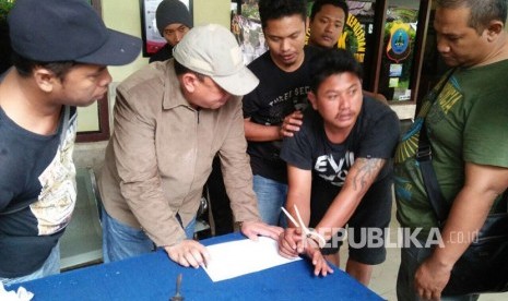 Oknum Polisi Brigadir Polisi Jumadi yang melakukan perampokan Rp 10 Miliar pada Bank Mandiri Kalimantan Selatan.