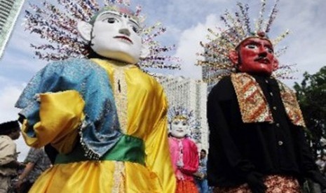 Ondel-ondel is traditional puppet in Betawi culture or Jakarta today (illustration). 