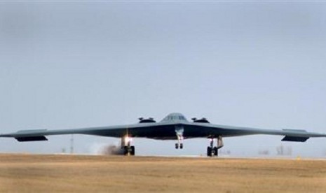 One of three Air Force Global Strike Command B-2 Spirit bombers returns to home base at Whiteman Air Force Base in Missouri, March 20, 2011.