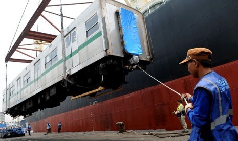 One of used Japanese coaches is unloaded from a cargo ship in Jakarta on Monday.  