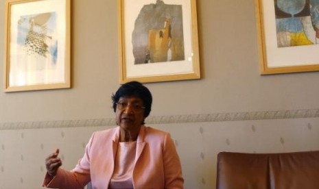 Outgoing UN Human Rights Commissioner Navi Pillay talks during an interview to Reuters in her office in Geneva August 19, 2014.