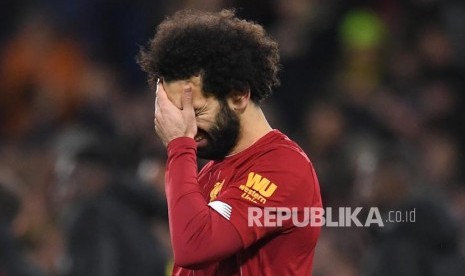 Reaksi Mohamed Salah pada akhir laga antara Watford melawan Liverpool di Watford, Inggris, Ahad (1/3) dini hari.