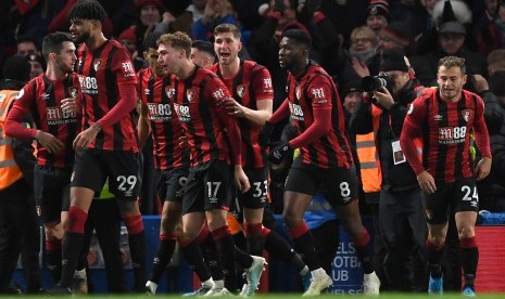 Para pemain Bournemouth merayakan gol (ilustrasi). Bournemout menganulir keputusan merumahkan karyawan dan tetap membayar penuh gaji mereka.