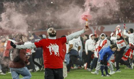 Para pemain dan penggemar Georgia merayakan keberhasilan memenangi play-off UEFA EURO 2024. Georgia mengalahkan Yunani 4-2 lewat adu penalti di Tbilisi, Georgia, Rabu (26/3/2024) dini hari WIB untuk berlaga pada Euro 2024 di Jerman pada musim panas ini. 