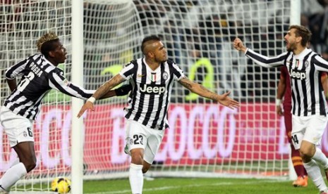 Para pemain Juventus melakukan selebrasi usai mencetak gol.