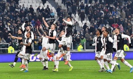 Para pemain Juventus merayakan keberhasilan menyingkirkan Udinese di babak 16 besar Coppa Italia.