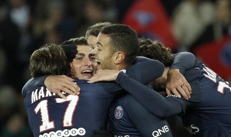 Para pemain Paris Saint-Germain merayakan gol Marco Verrati (kedua kiri) ke gawang Rennes dalam suatu laga Ligue 1 belum lama ini.