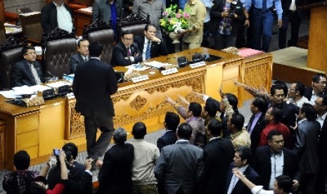 A plenary session at the parliament decides to put end on direct regional election. (illustration) 