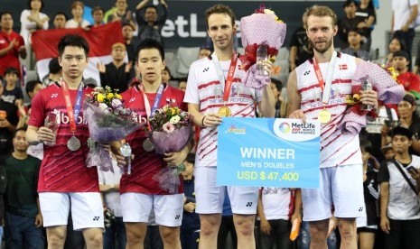 Pasangan ganda putra Indonesia, Marcus Fernaldi Gideon/Kevin Sanjaya Sukamuljo harus puas menjadi runner up di turnamen Korea Open Super Series 2017 setelah dikalahkan pasangan Denmark, Mathias Boe/Carsten Mogensen di babak final, Ahad (17/9).