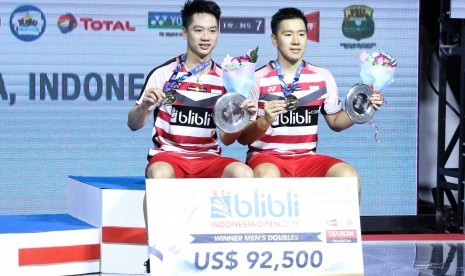 Pasangan ganda putra Indonesia, Marcus Fernaldi Gideon/Kevin Sanjaya Sukamuljo menjuarai turnamen Blibli Indonesia Open 2018 Super 1000, Ahad (8/7).