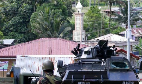 Pasukan pemerintah Filipina di Kota Marawi, Selasa, 30 Mei 2017. Sekitar 61 militan Maute telah tewas dalam pertempuran melawan militer Filipina dalam sepekan terakhir.