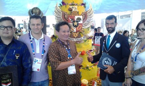 Paviliun Indonesia meraih Guinness Book Record sengan titel nasi tumpeng tertinggi di dunia pada Senin (18/8).