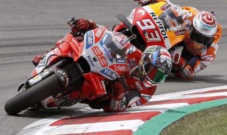 Pebalap Ducati, Corse Jorge Lorenzo (depan)