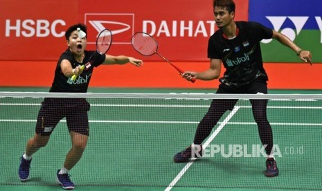 Pebulu tangkis ganda campuran Indonesia Tontowi Ahmad (kanan) dan Apriyani Rahayu.