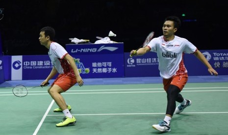 Pebulu tangkis ganda putra Indonesia Hendra Setiawan dan Muhammad Aksan.