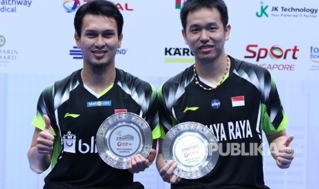 Hendra Setiawan (kanan) dan Mohammad Ahsan lolos ke turnamen bulu tangkis BWF World Tour Final 2018.