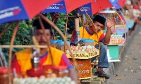 Pedagang kerak telor. (ilustrasi)