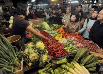 Pedagang sayur mayur di pasar tradisional (ilustrasi). 