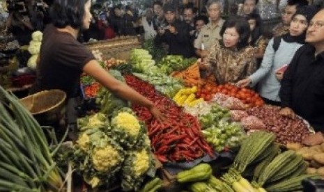 Pedagang sayur mayur di pasar tradisional (ilustrasi). 