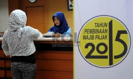 Perluasan basis pajak dan meningkatkan kepatuhan jadi tantangan. Ilusrasi pajak