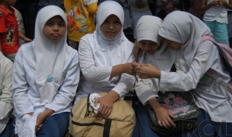 Pelajar berjilbab.