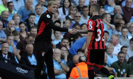 Pelatih Bournemouth, Eddie Howe (kiri) dan gelandang, Jack Wilshere.