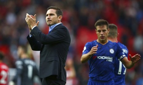 Pelatih Chelsea, Frank Lampard seusai laga Liga Primer Inggris kontra Manchester United, di Old Trafford, Ahad (11/8).