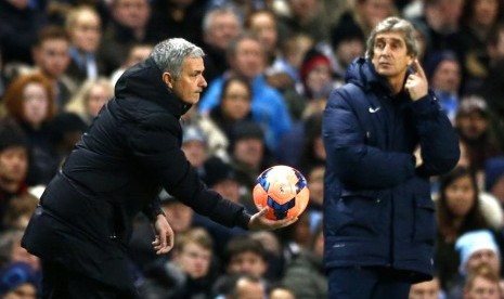 Pelatih Jose Mourinho dan Manuel Pellegrini.