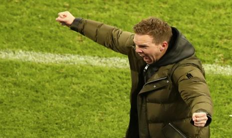 Pelatih kepala Leipzig Julian Nagelsmann merayakan pertandingan sepak bola grup H Liga Champions antara RB Leipzig dan Manchester United di RB Arena di Leipzig, Jerman, Selasa, 8 Desember 2020.