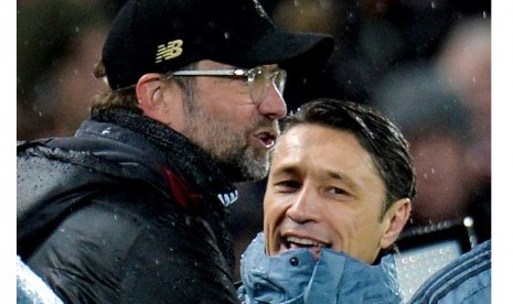 Pelatih Liverpool Juergen Klopp (kiri) dan pelatih Bayern Muenchen Niko Kovac.