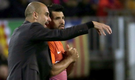 Pelatih Manchester City, Pep Guardiola (kiri) dan striker, Sergio Aguero.