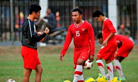 Pelatih Timnas PSSI Nil Maizar bersama Firman Utina