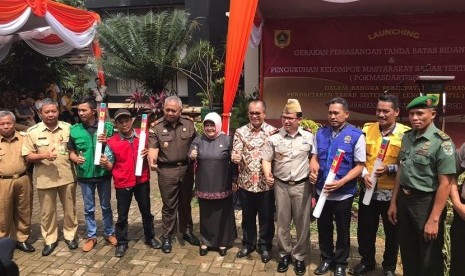 Peluncuran Program  PTSL 2018 dan Kelompok Masyarakat Sadar Tertib Pertanahan di Ciseeng, Kab Bogor, Selasa (30/1).