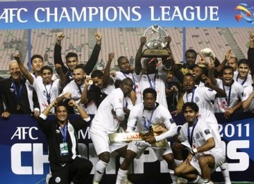 Pemain Al Sadd meluapkan kegembiraannya usai menjuarai Liga Champions Asia 2011.