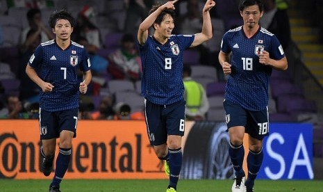 Pemain Jepang merayakan gol ketiga ke gawang Iran pada semifinal Piala Asia 2019.