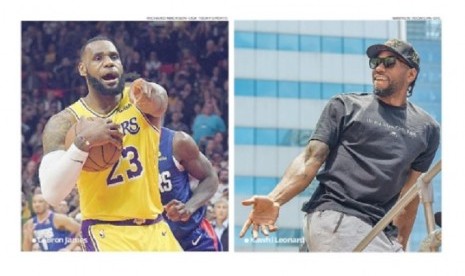 Pemain Lakers, LeBron James (kiri) dan pemain Clippers, Kawhi Leonard (kanan).