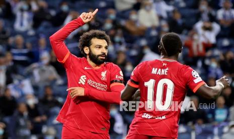  Pemain Liverpool Mohamed Salah dan Sadio Mane. Keduanya tak akan ada dalam skuad Liverpool saat menghadapi Arsenal di semifinal Piala Liga Inggris.